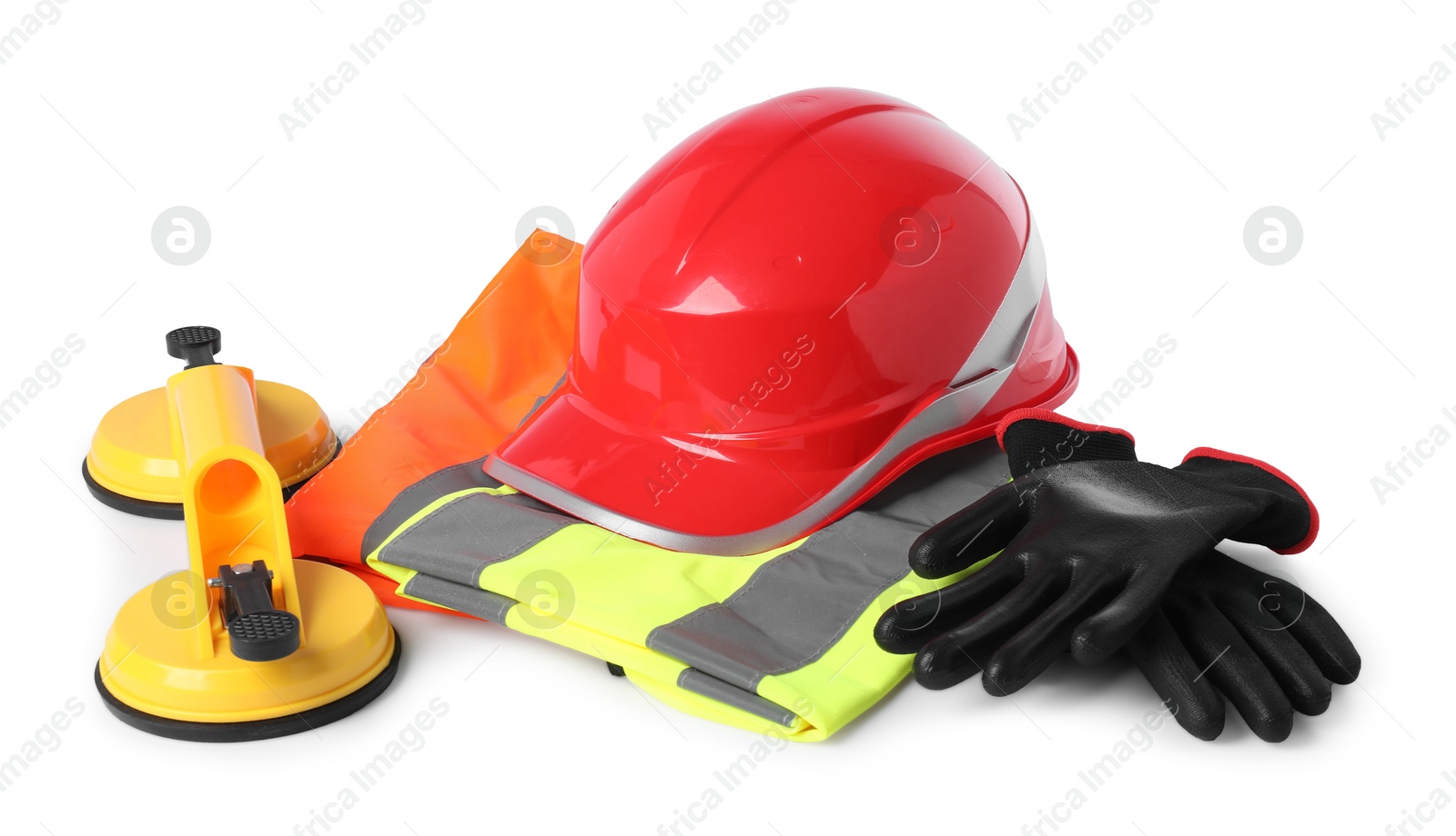 Photo of Hard hat, protective gloves, glass suction cups and reflective vest isolated on white