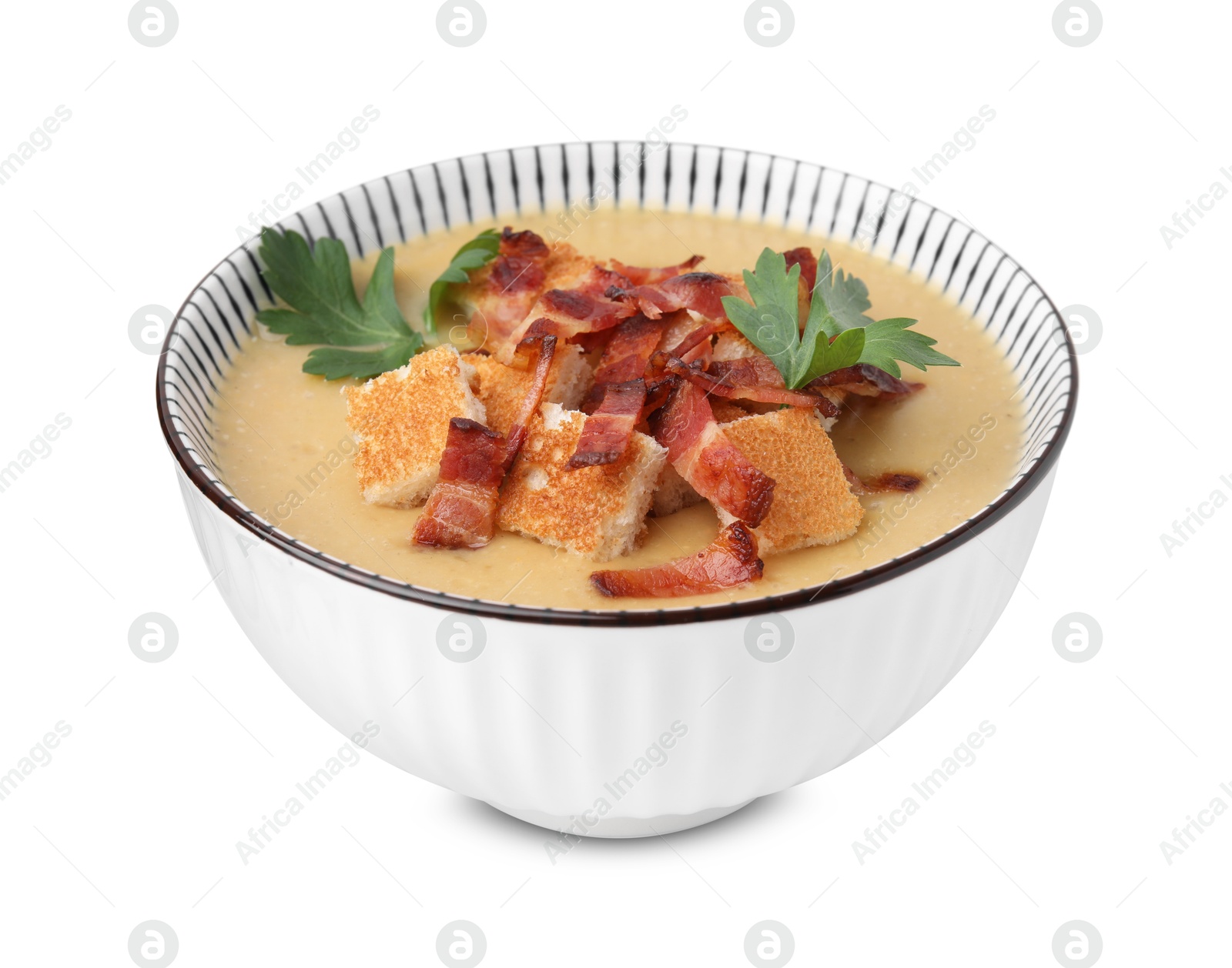 Photo of Delicious lentil soup with bacon and parsley in bowl isolated on white