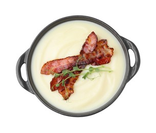 Photo of Delicious potato soup with bacon and microgreens in bowl isolated on white, top view