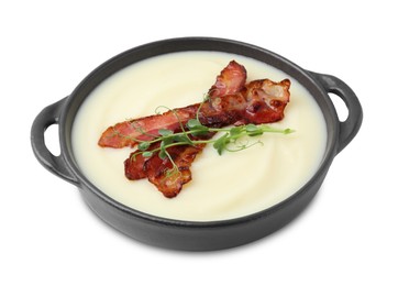 Photo of Delicious potato soup with bacon and microgreens in bowl isolated on white