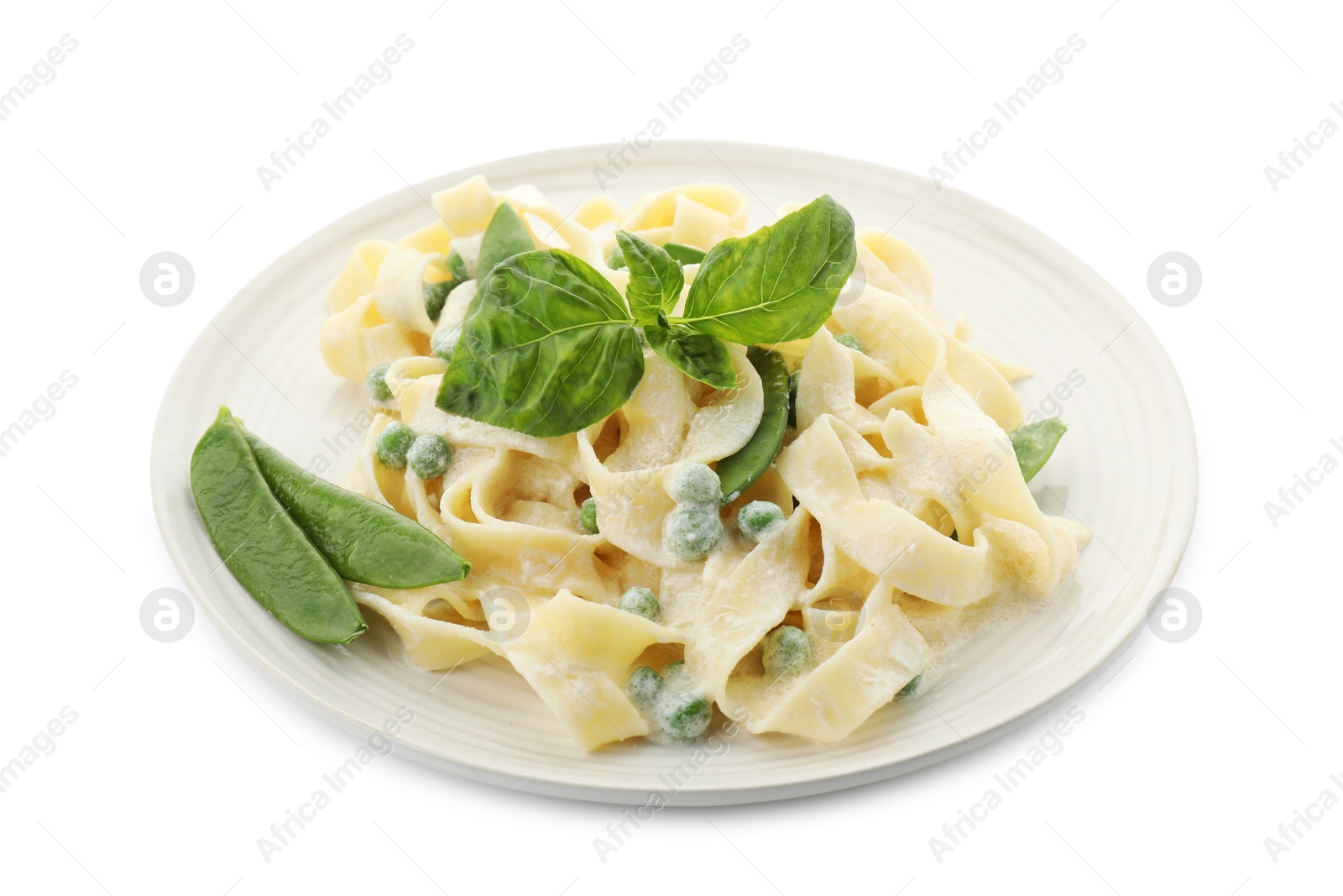 Photo of Delicious pasta with green peas and creamy sauce isolated on white