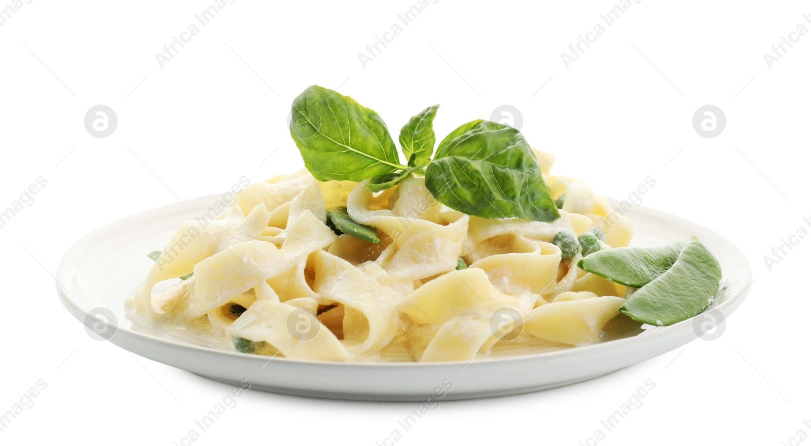 Photo of Delicious pasta with green peas and creamy sauce isolated on white