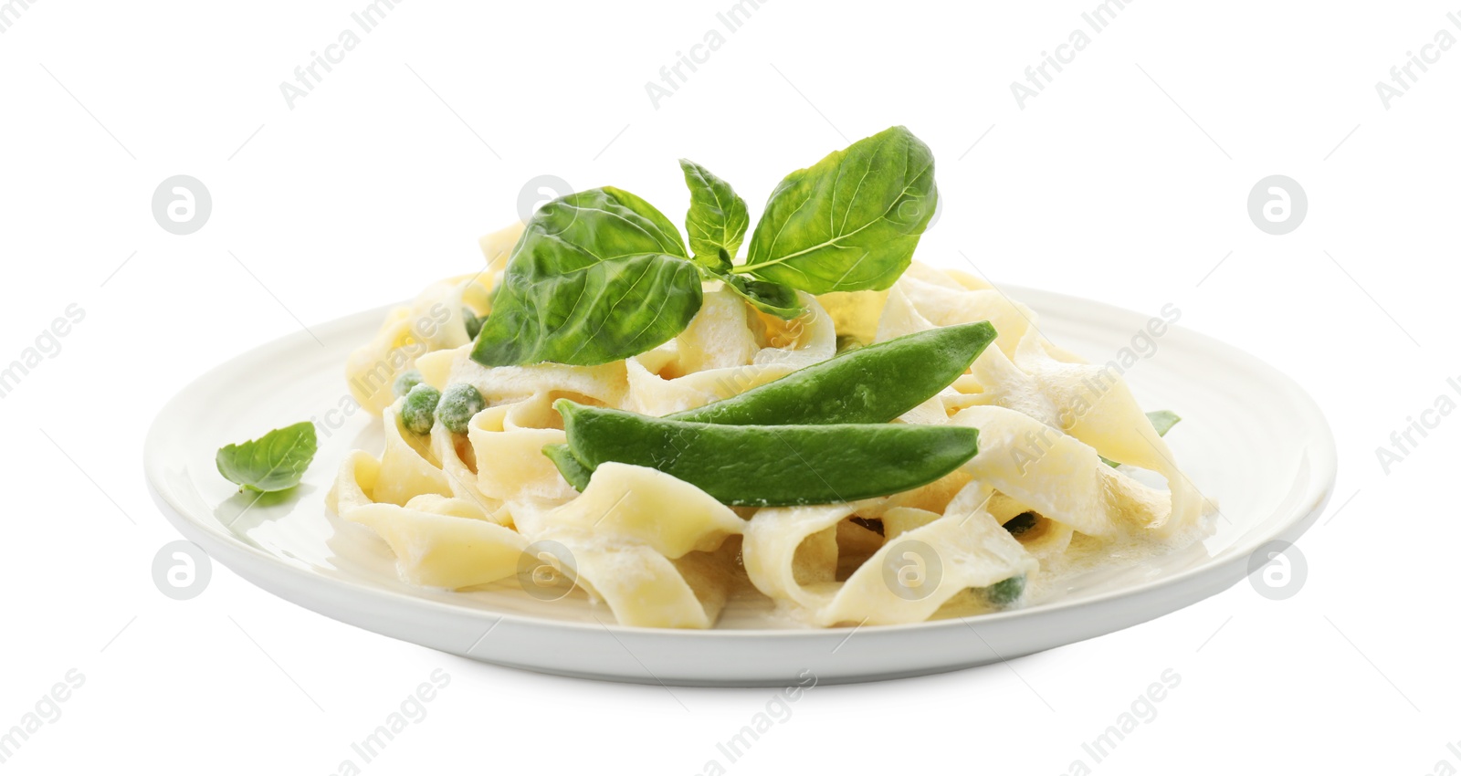 Photo of Delicious pasta with green peas and creamy sauce isolated on white