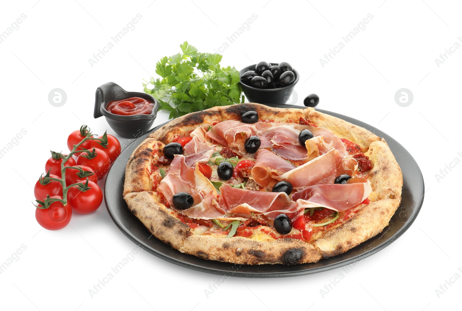 Photo of Tasty pizza with cured ham, olives, tomatoes, parsley and sauce isolated on white