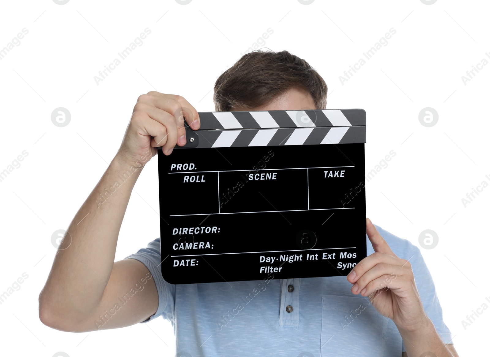 Photo of Making movie. Man covering face with clapperboard on white background