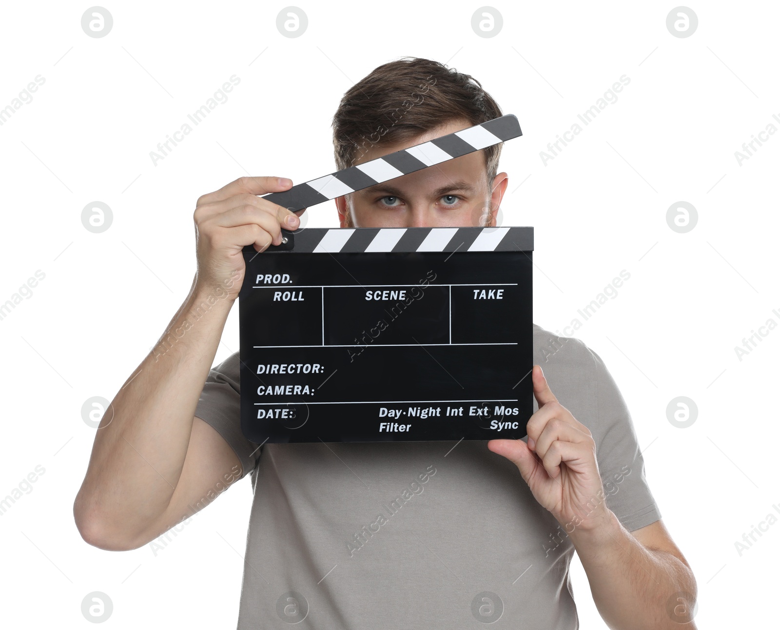 Photo of Making movie. Man with clapperboard on white background