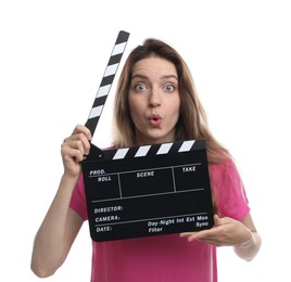 Making movie. Surprised woman with clapperboard on white background