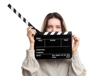 Photo of Making movie. Woman with clapperboard on white background