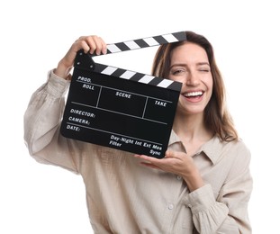 Making movie. Smiling woman with clapperboard on white background