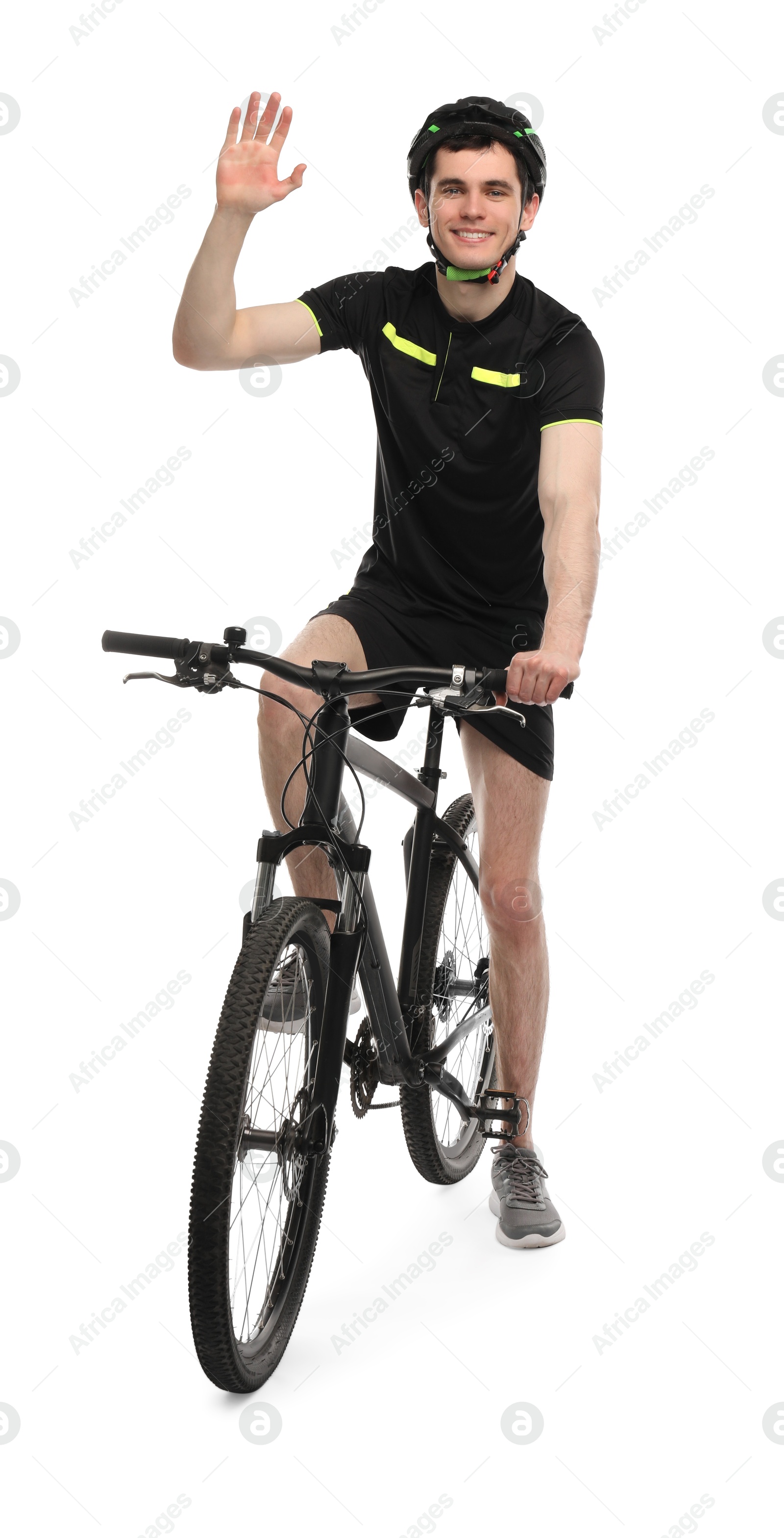 Photo of Smiling man in helmet riding bicycle on white background