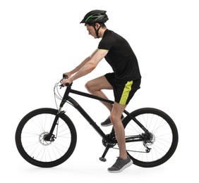 Man in helmet riding bicycle on white background