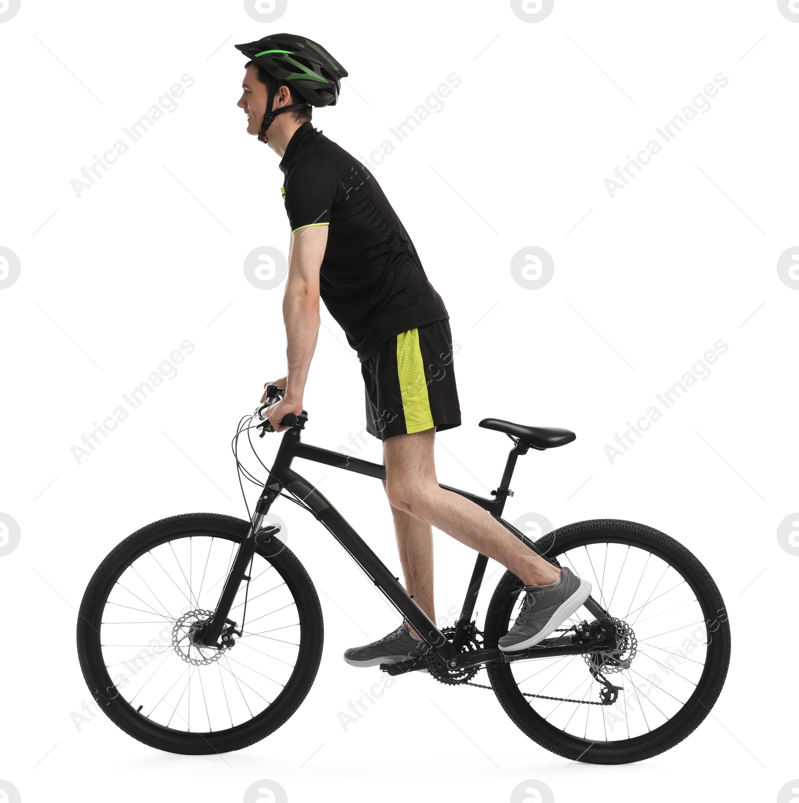 Photo of Man in helmet riding bicycle on white background