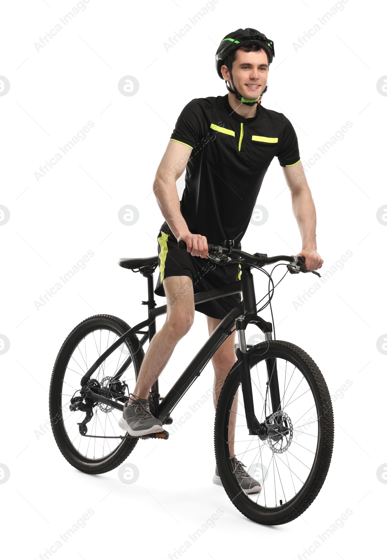 Photo of Smiling man in helmet riding bicycle on white background