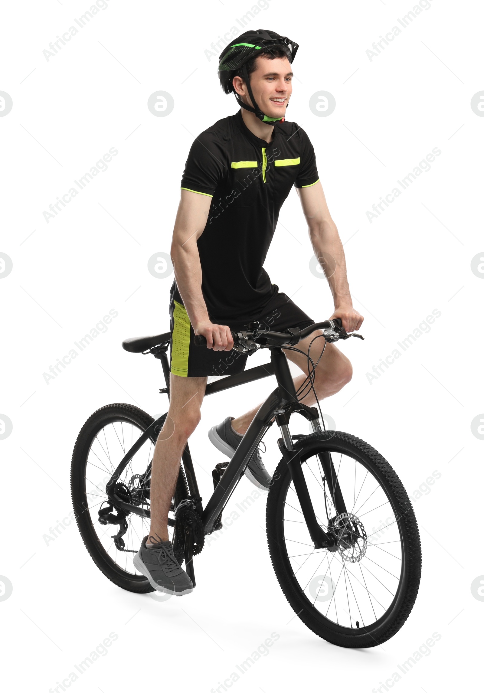 Photo of Smiling man in helmet riding bicycle on white background