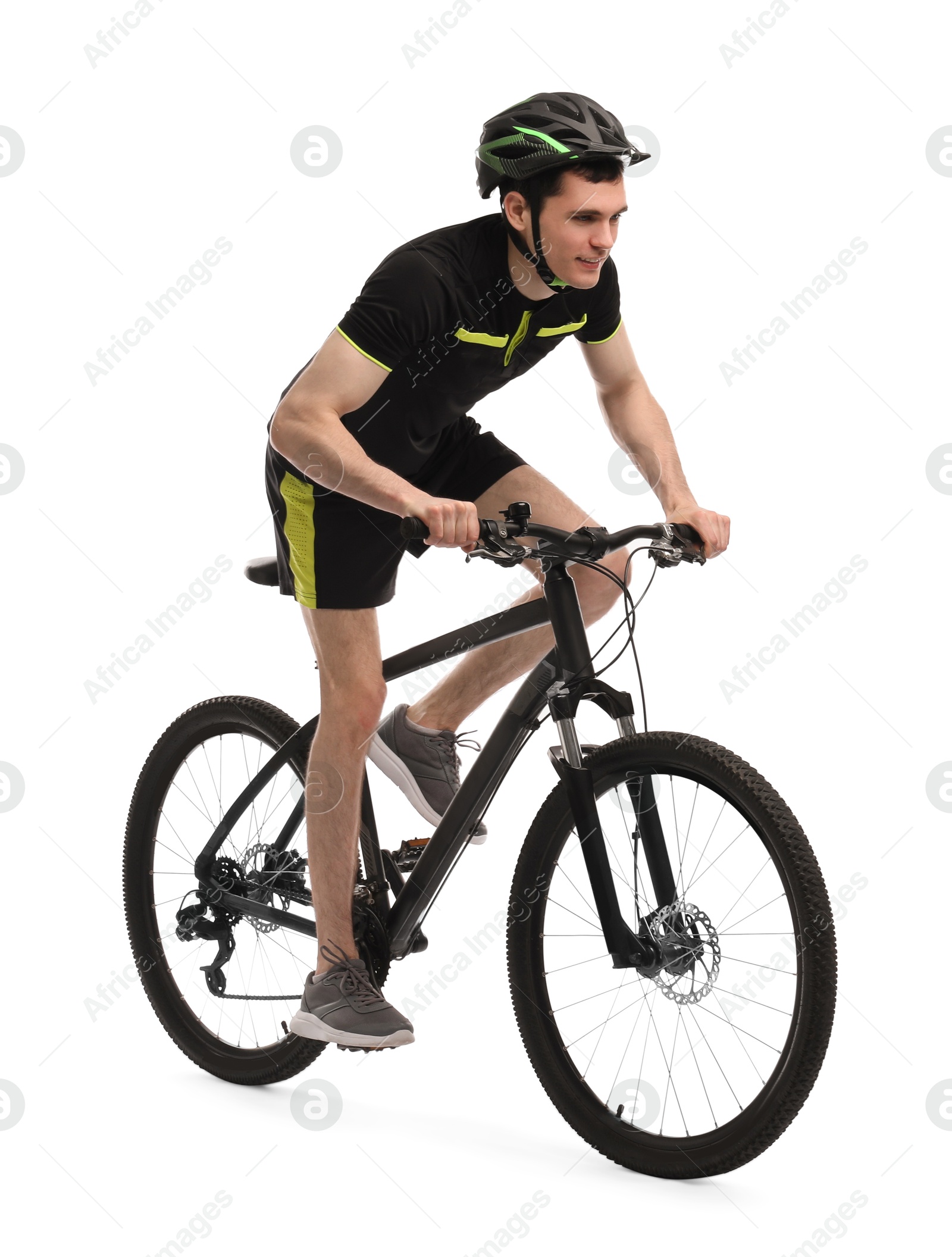 Photo of Smiling man in helmet riding bicycle on white background