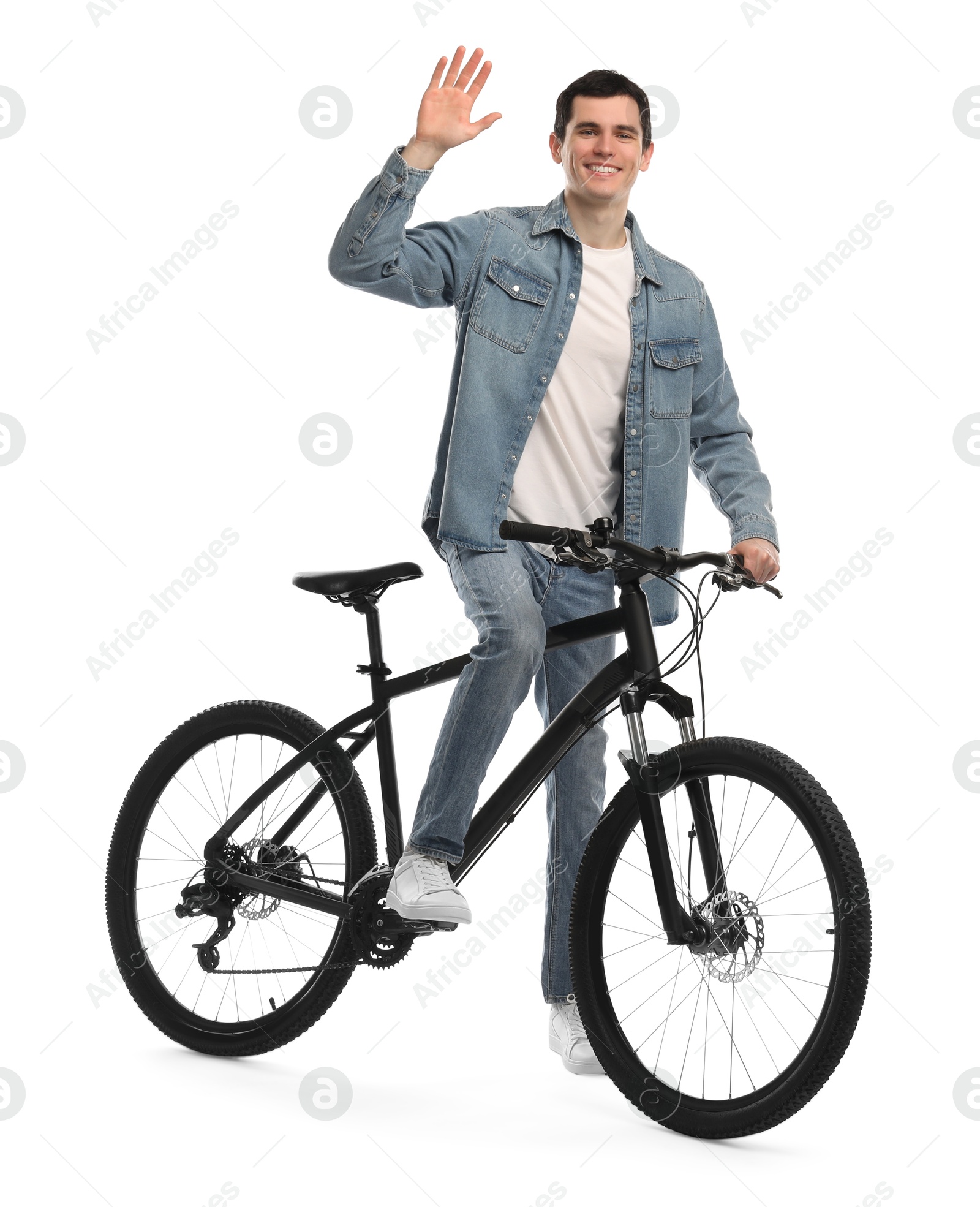 Photo of Smiling man with bicycle isolated on white