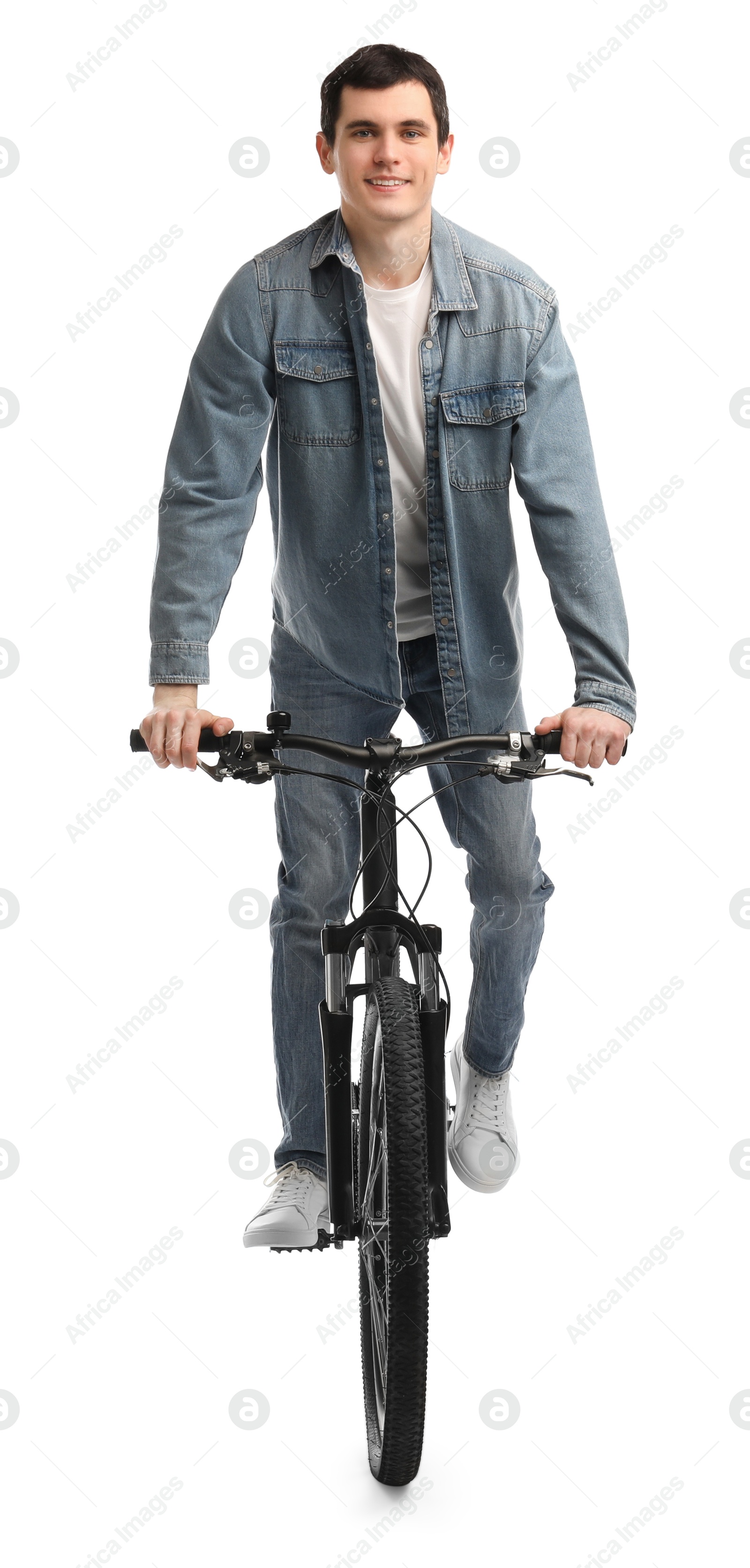 Photo of Smiling man riding bicycle on white background