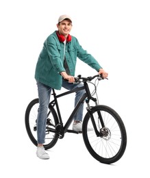 Photo of Smiling man with headphones on bicycle against white background