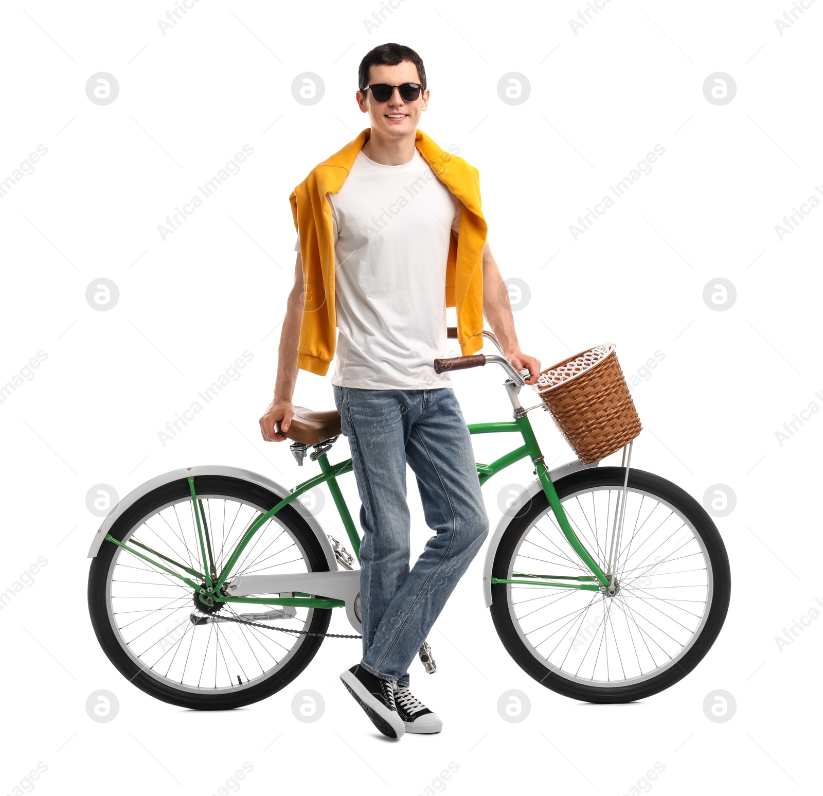 Photo of Smiling man in sunglasses near bicycle with basket isolated on white