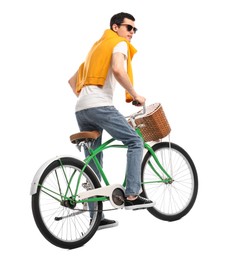 Photo of Man in sunglasses riding bicycle with basket on white background