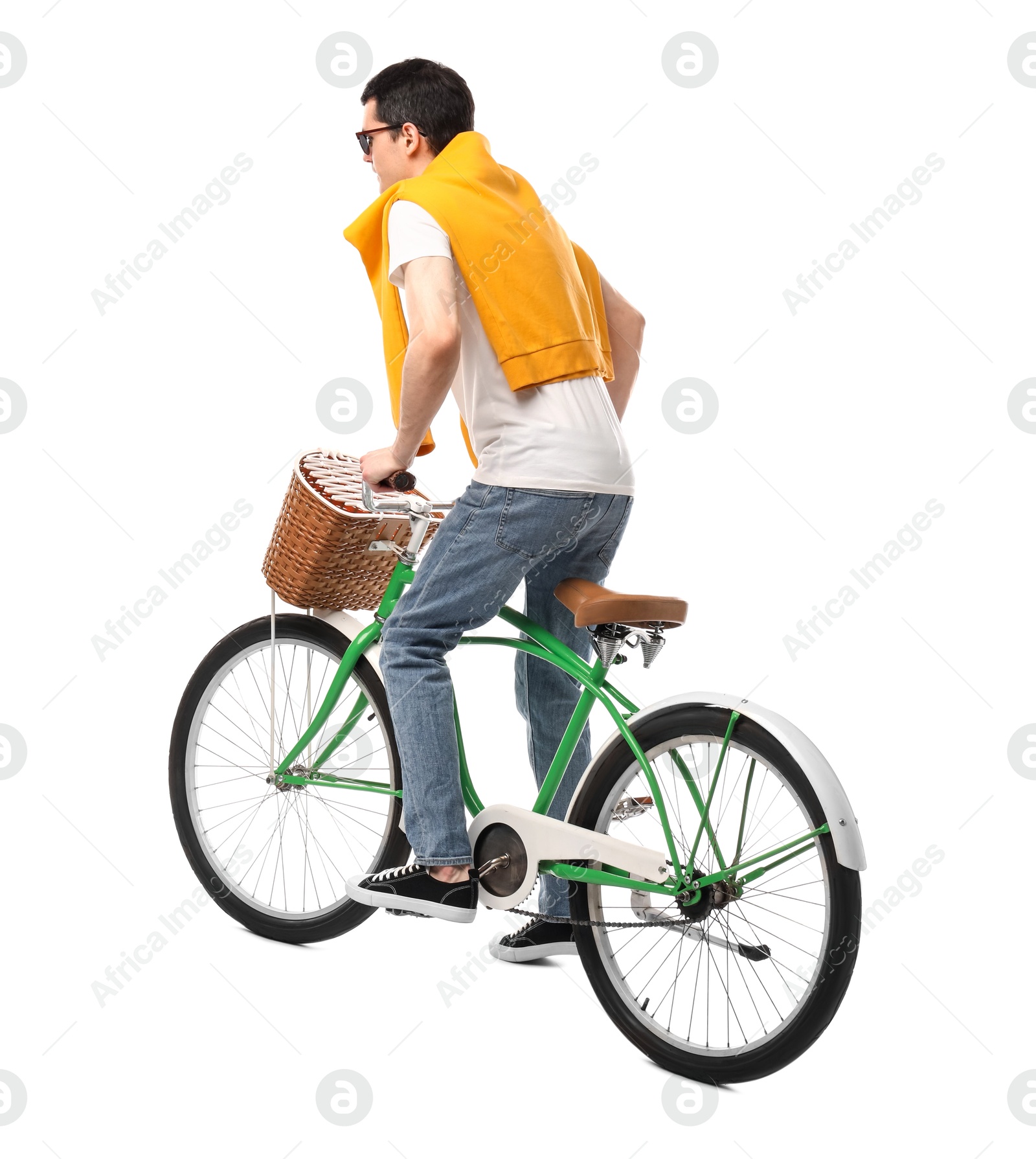 Photo of Man in sunglasses riding bicycle with basket on white background