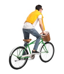 Photo of Man in sunglasses riding bicycle with basket on white background