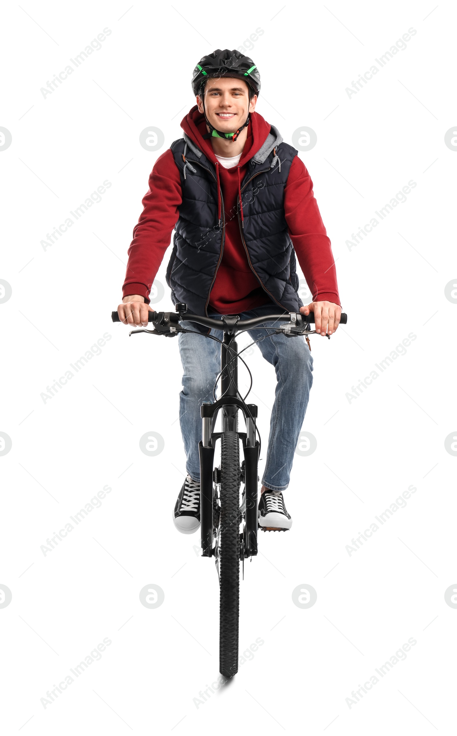 Photo of Smiling man in helmet riding bicycle on white background