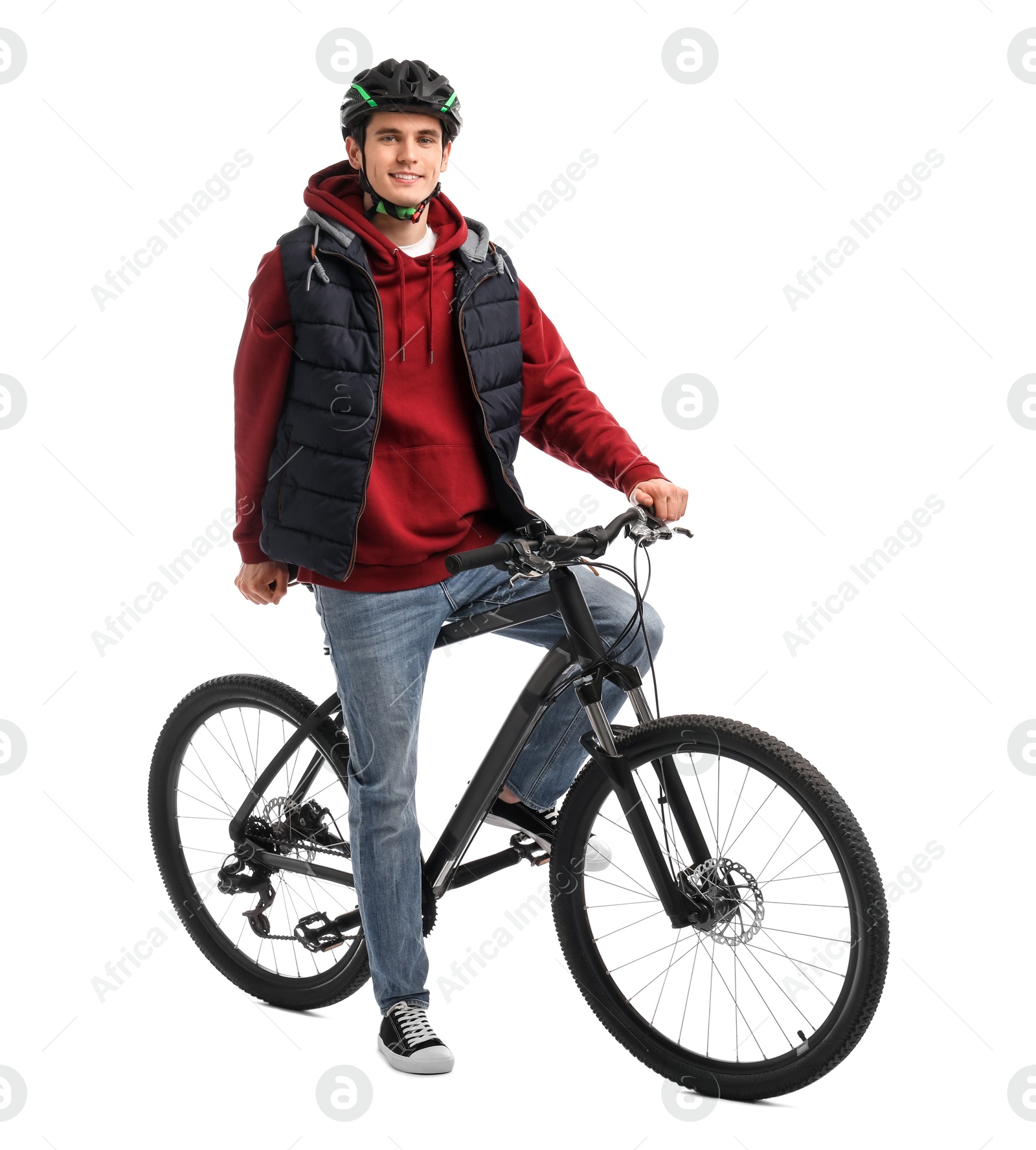 Photo of Smiling man in helmet on bicycle against white background