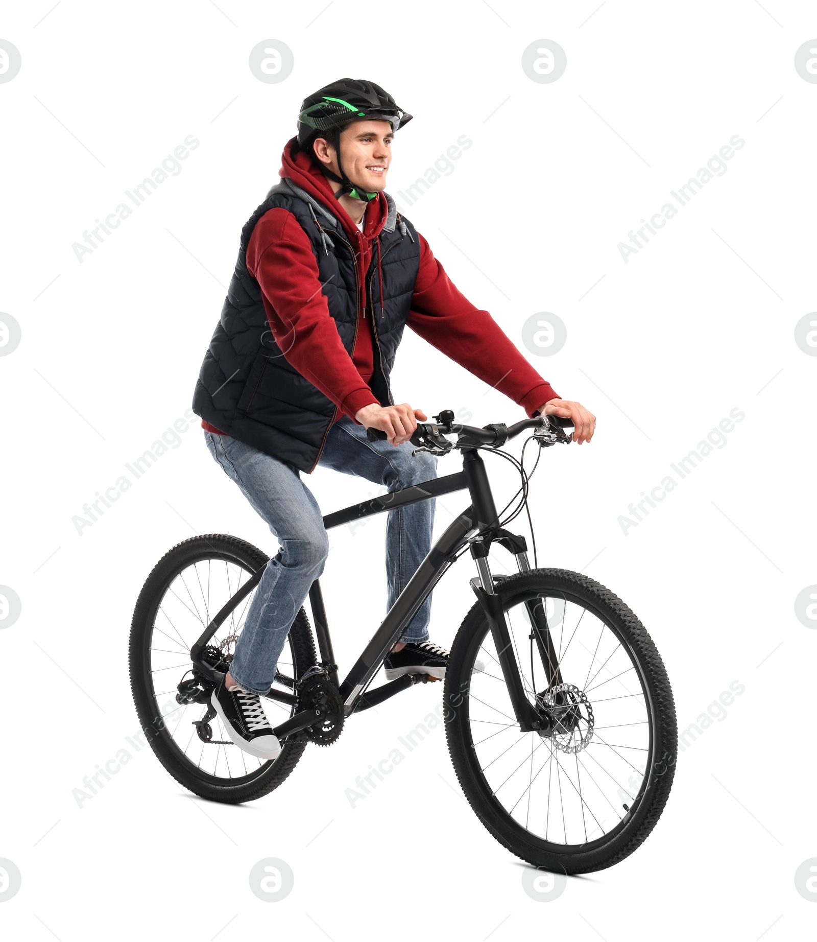 Photo of Smiling man in helmet riding bicycle on white background