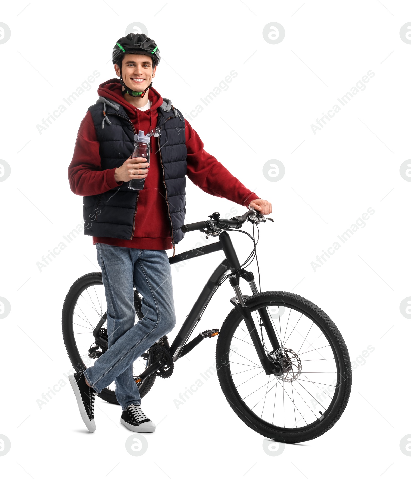 Photo of Smiling man in helmet with bicycle and bottle of water isolated on white