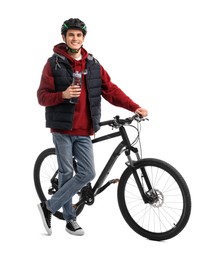 Smiling man in helmet with bicycle and bottle of water isolated on white