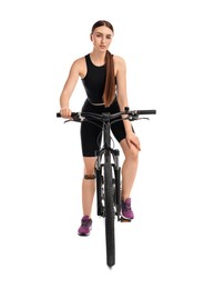 Beautiful young woman on bicycle against white background