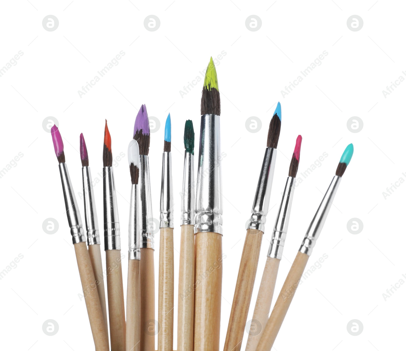 Photo of Wooden brushes with colorful paints isolated on white