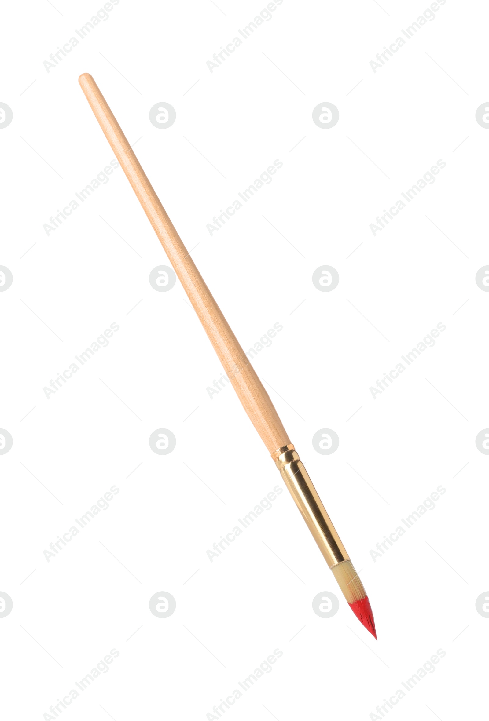 Photo of Wooden brush with red paint isolated on white