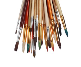 Photo of Many different paint brushes on white background