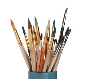 Many different paint brushes on white background