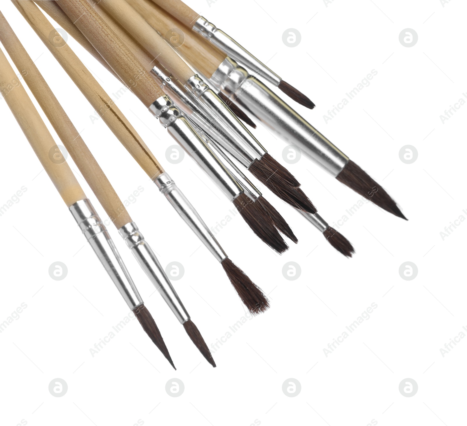 Photo of Many different paint brushes on white background