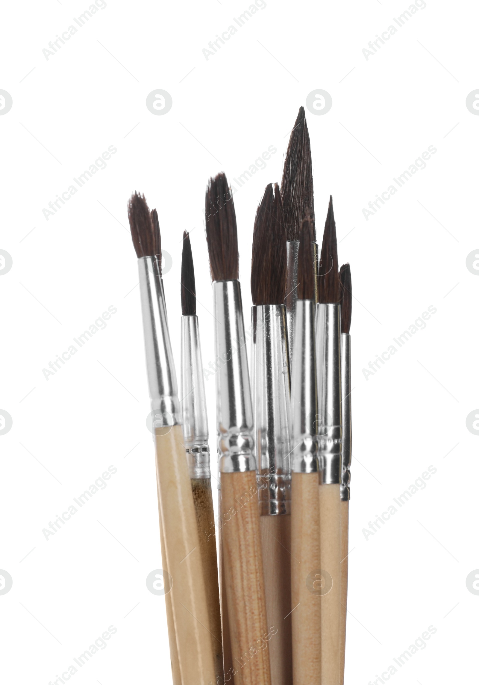 Photo of Many different paint brushes on white background