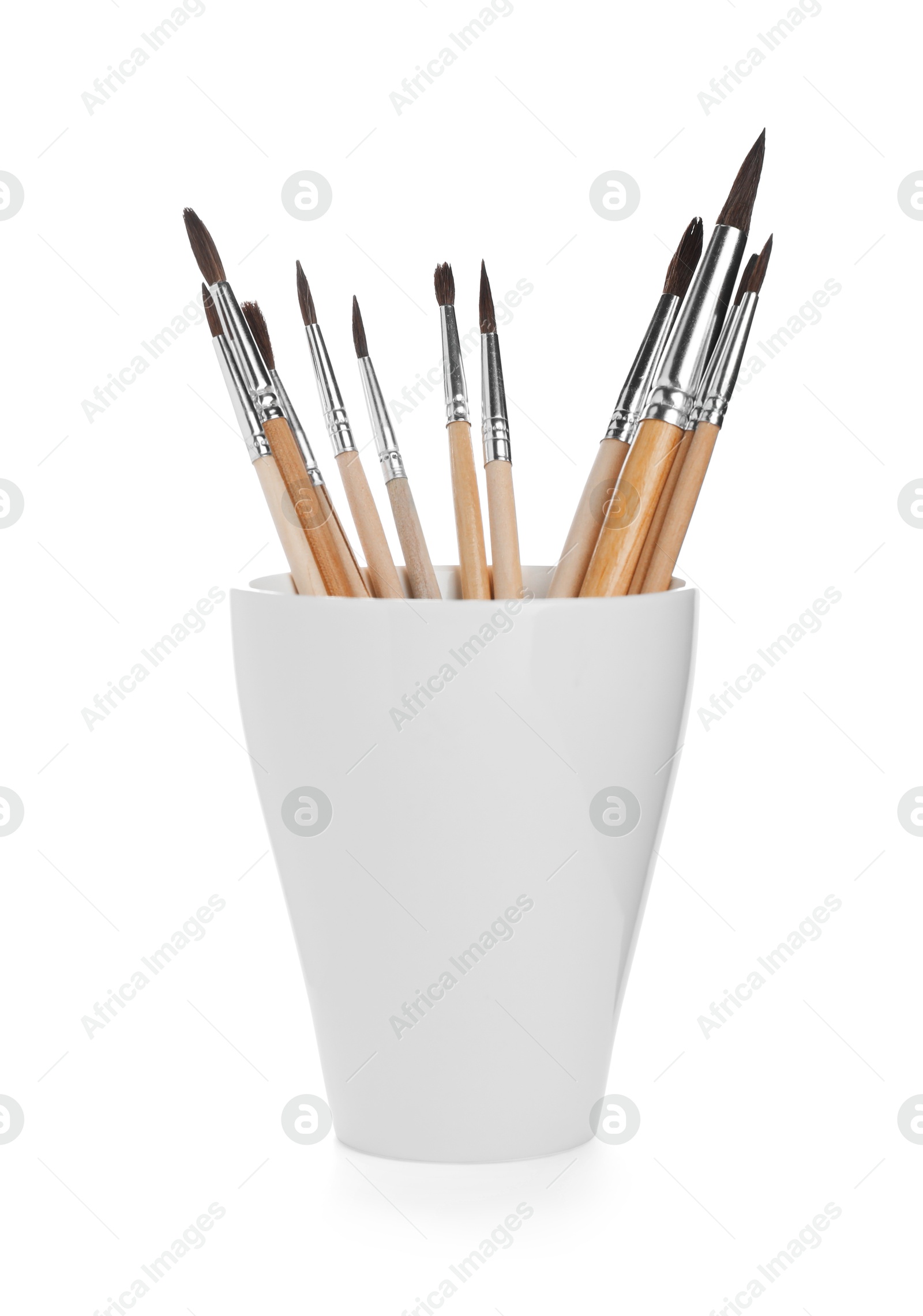 Photo of Many different paint brushes on white background