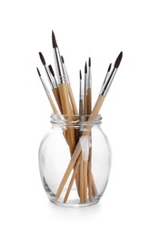 Photo of Many different paint brushes on white background