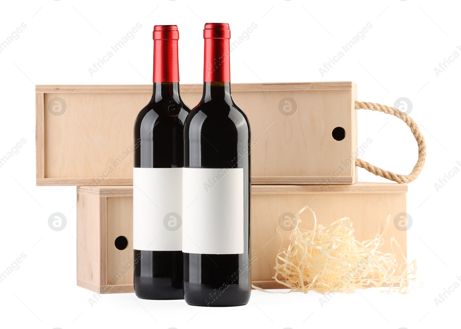 Photo of Wooden gift boxes with wine isolated on white