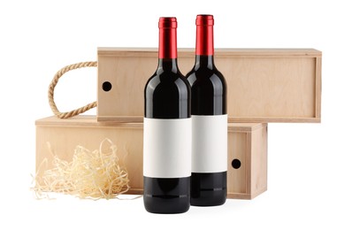 Wooden gift boxes with wine isolated on white