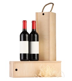 Wooden gift boxes with wine isolated on white