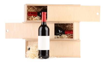 Wooden gift boxes with wine isolated on white