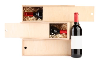 Wooden gift boxes with wine isolated on white