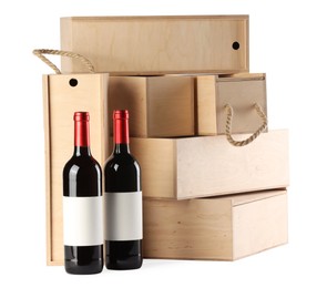 Wooden gift boxes with wine isolated on white