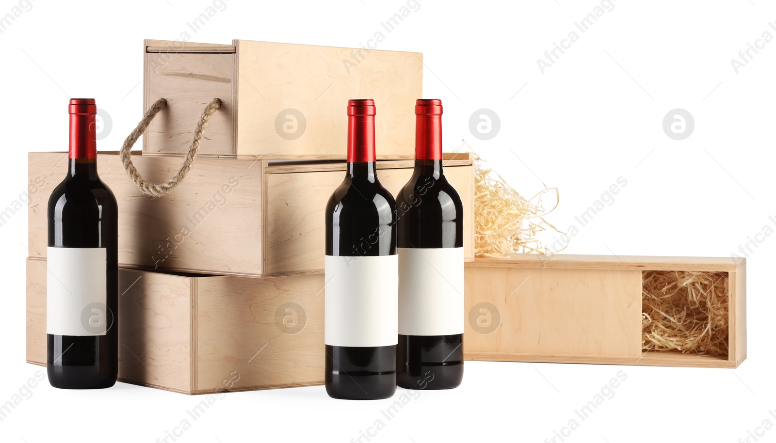 Photo of Wooden gift boxes with wine isolated on white