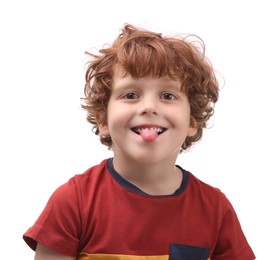 Portrait of emotional little boy showing tongue on white background