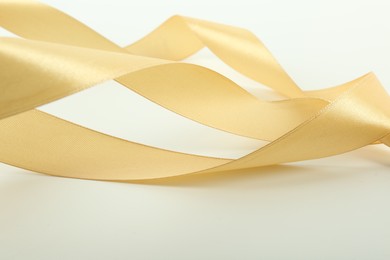 One beautiful light yellow ribbon isolated on white