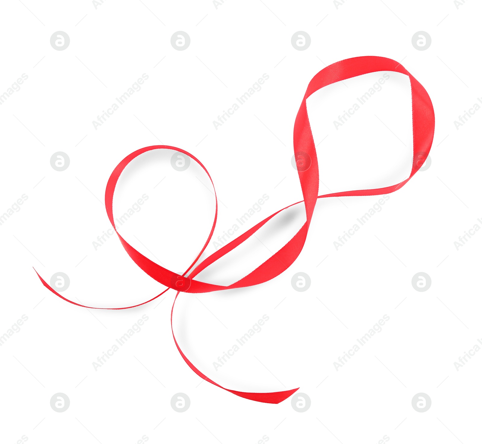 Photo of Beautiful red ribbon isolated on white, top view